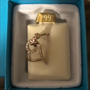 New in box, Piercing Pagoda real 10k belly ring with rose gold flower.